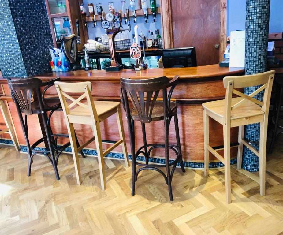 Traditional pub bar at The Six Bells